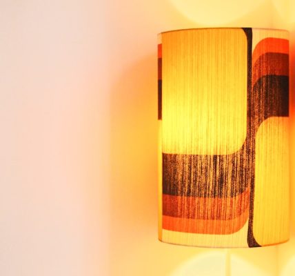 Photo Warm bedside wall lamps