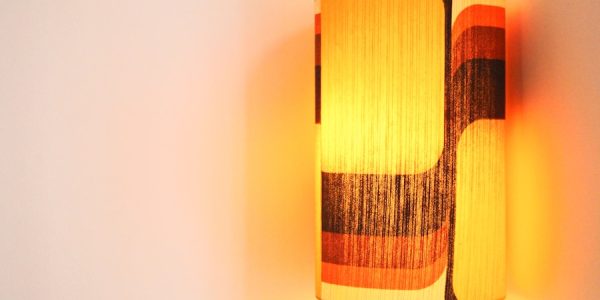 Photo Warm bedside wall lamps