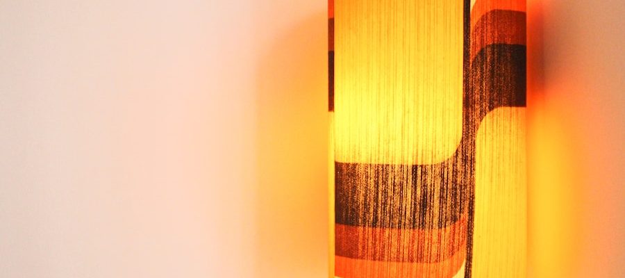 Photo Warm bedside wall lamps